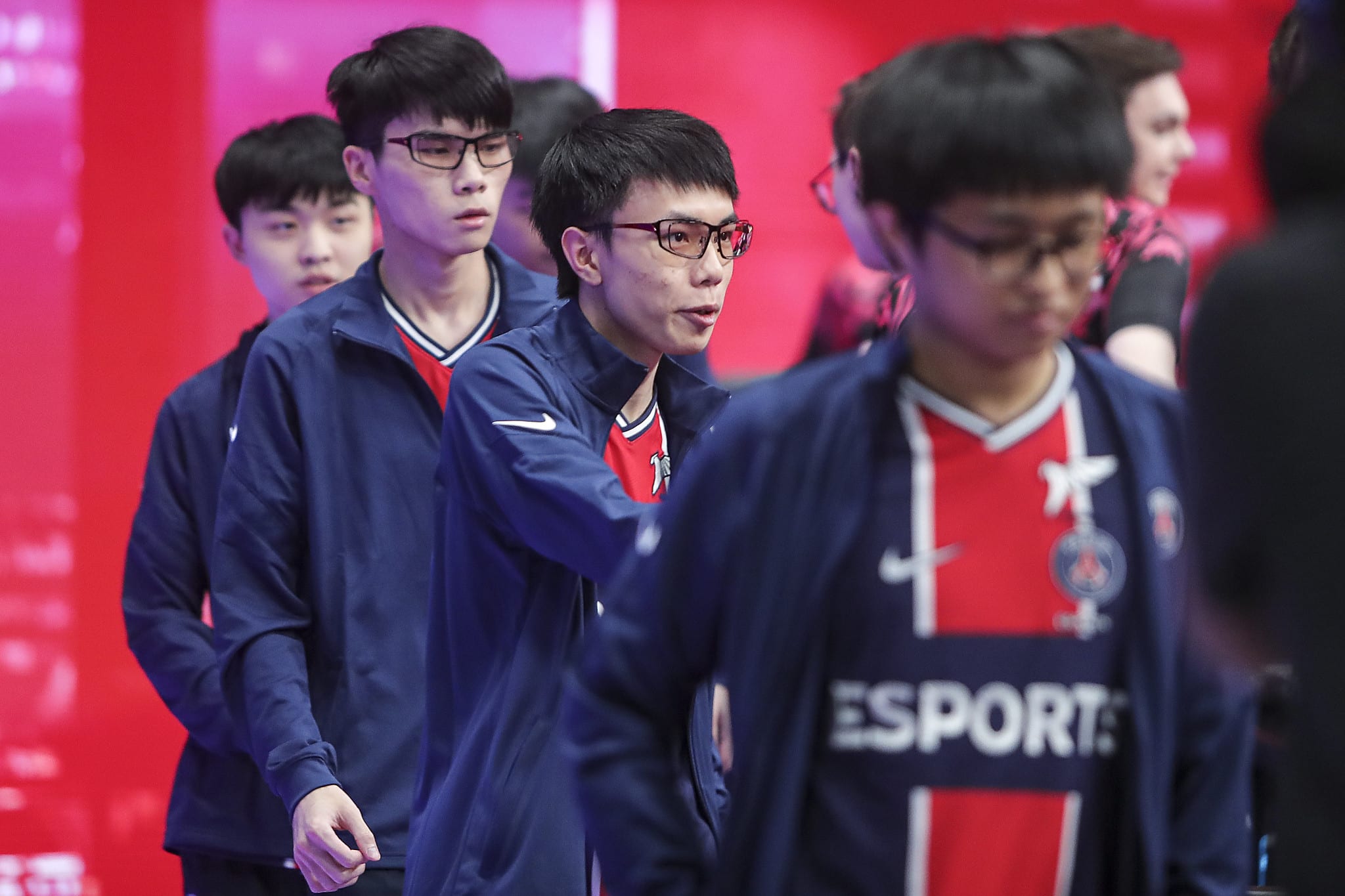 Kaiwing and his PSG teammates shake hands with their opponents at the 2020 World Championships