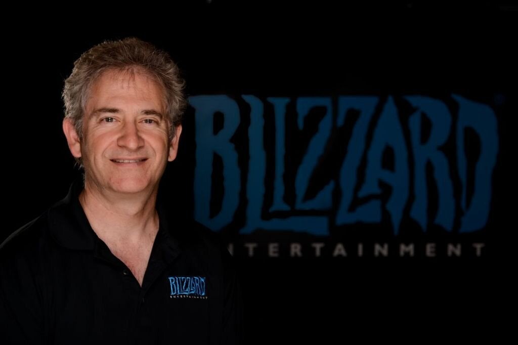 Mike Morhaime and Blizzard Logo