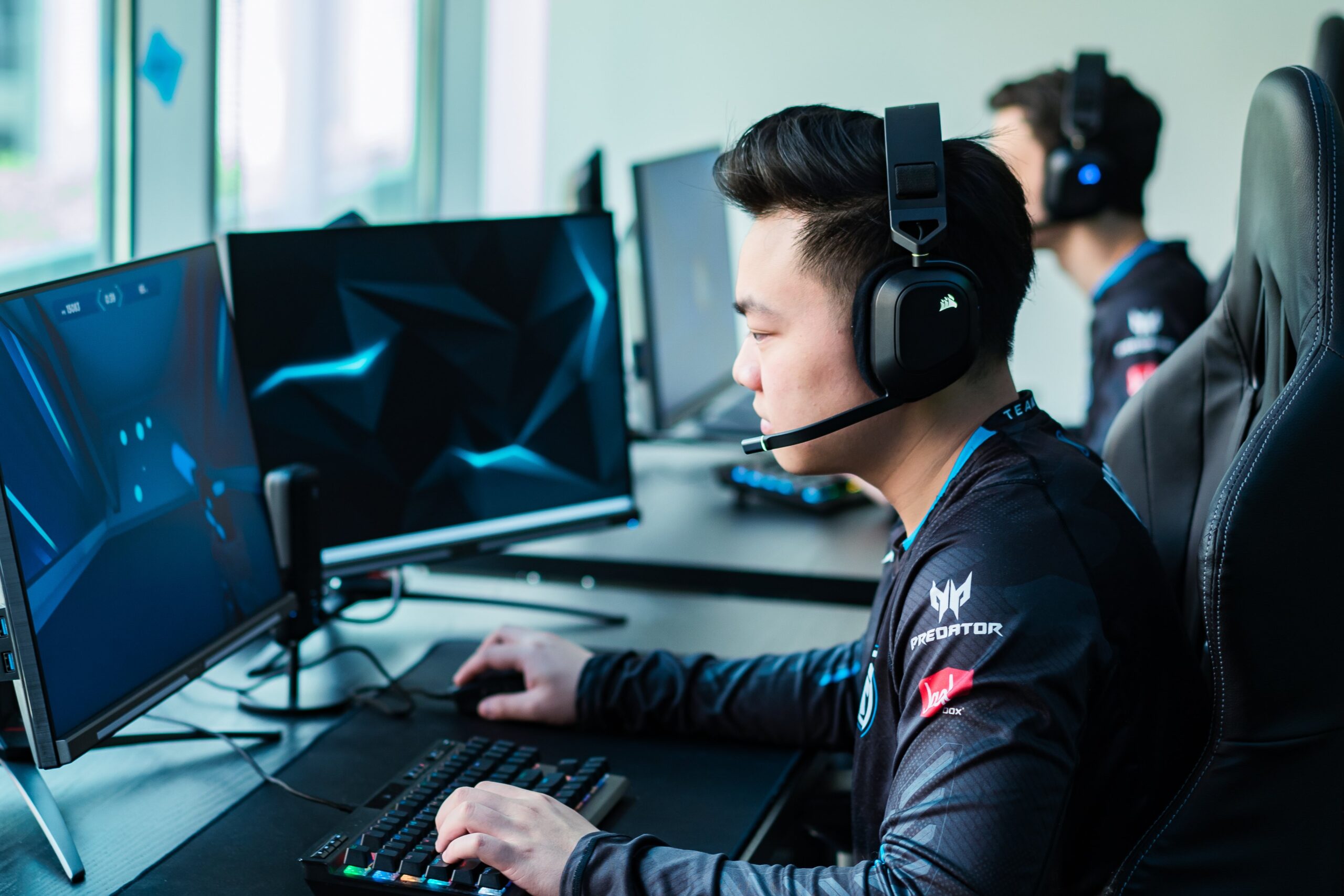 Victor from Envy facing a computer, prepping for Masters Berlin
