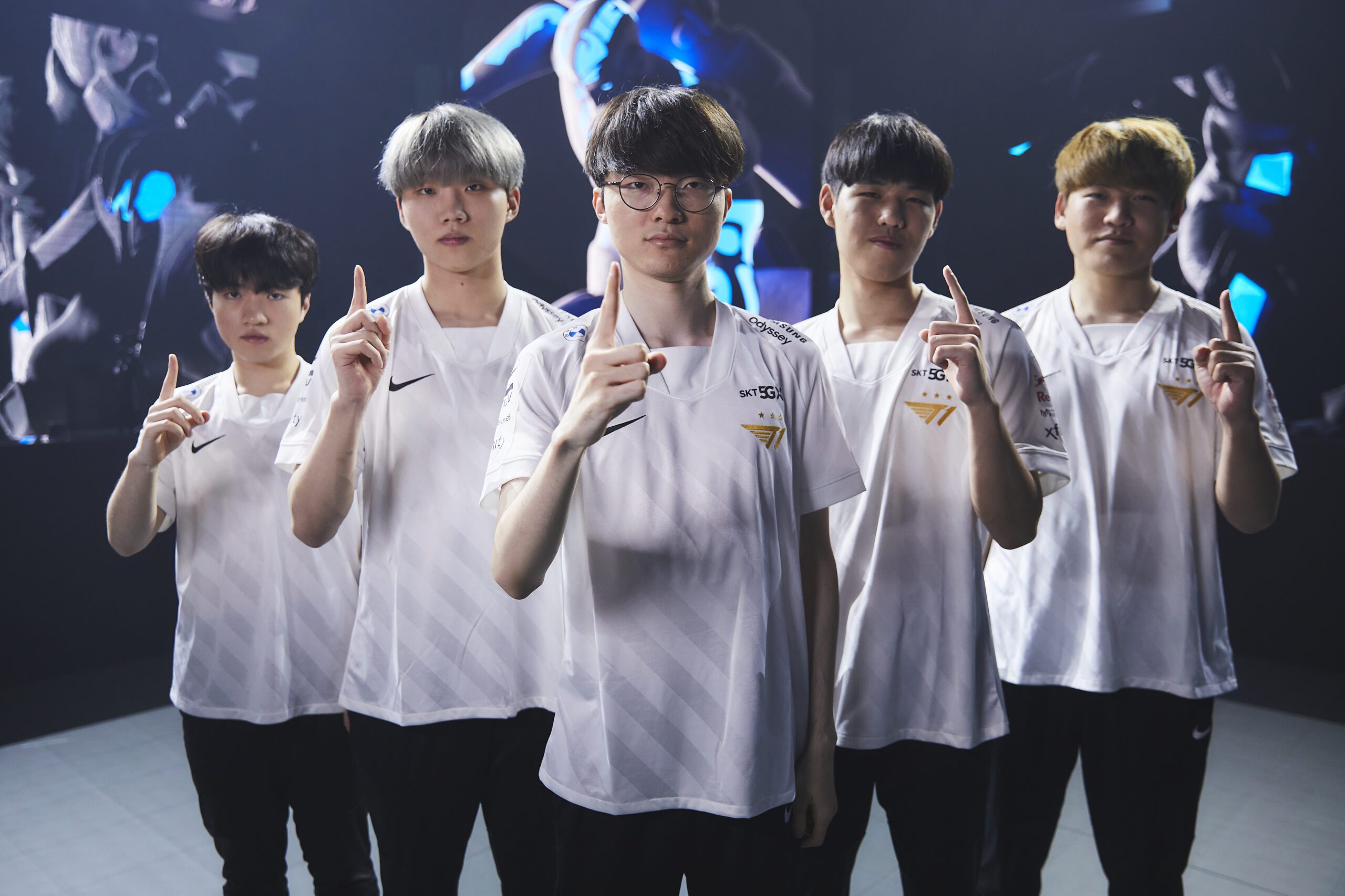 T1 stands together on the Worlds 2021 stage