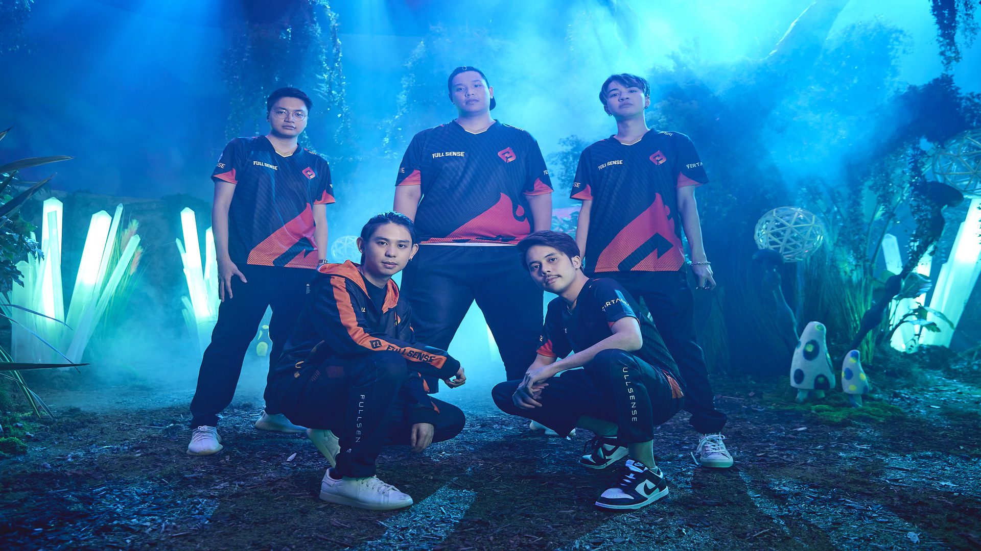 FULL SENSE poses at the VALORANT Champions Features Day on November 3. They are wearing their orange and black VCT Champions jerseys